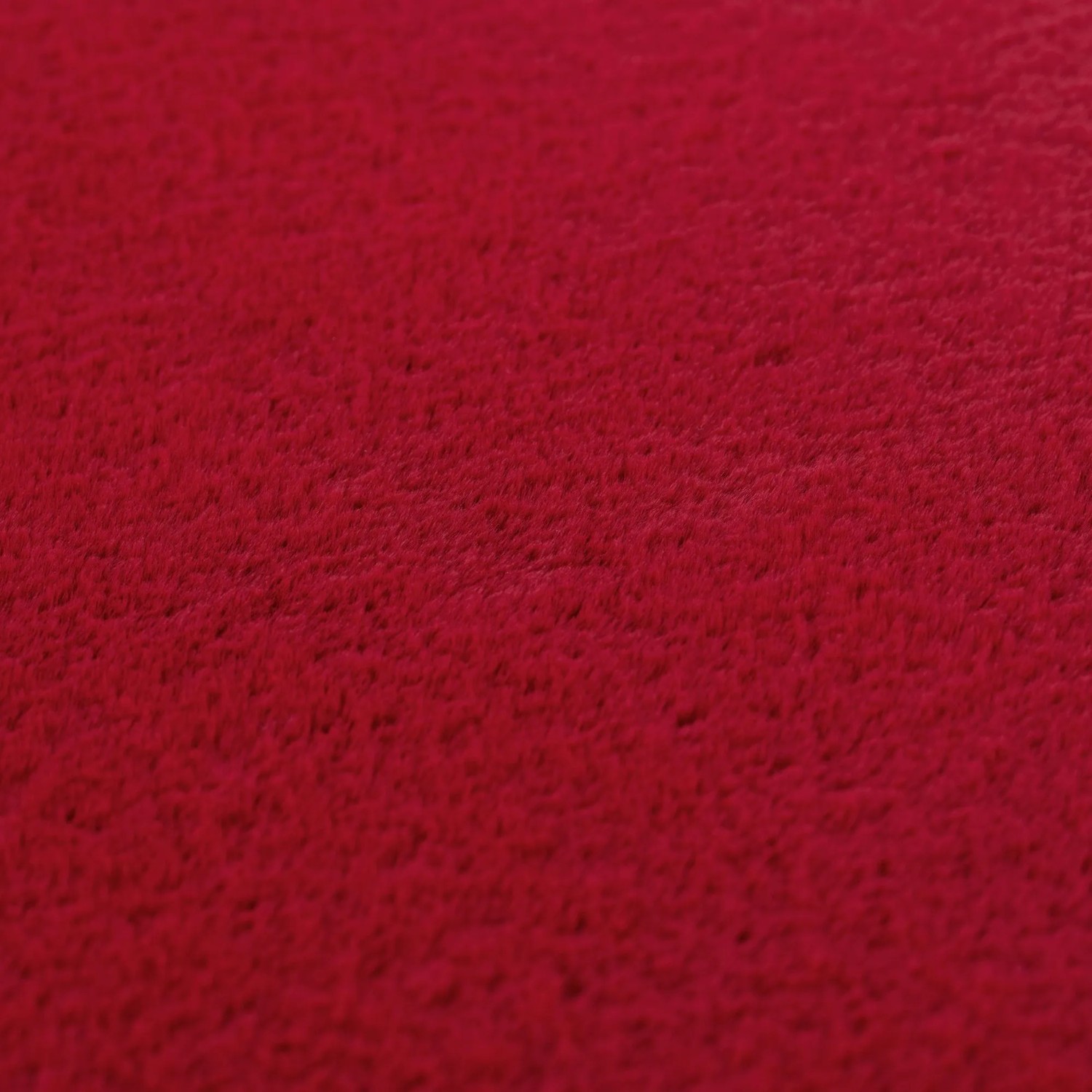 Detailaufnahme: Roter Ayyildiz Kurzflorteppich Joy, moderner Teppich mit weicher Oberfläche.