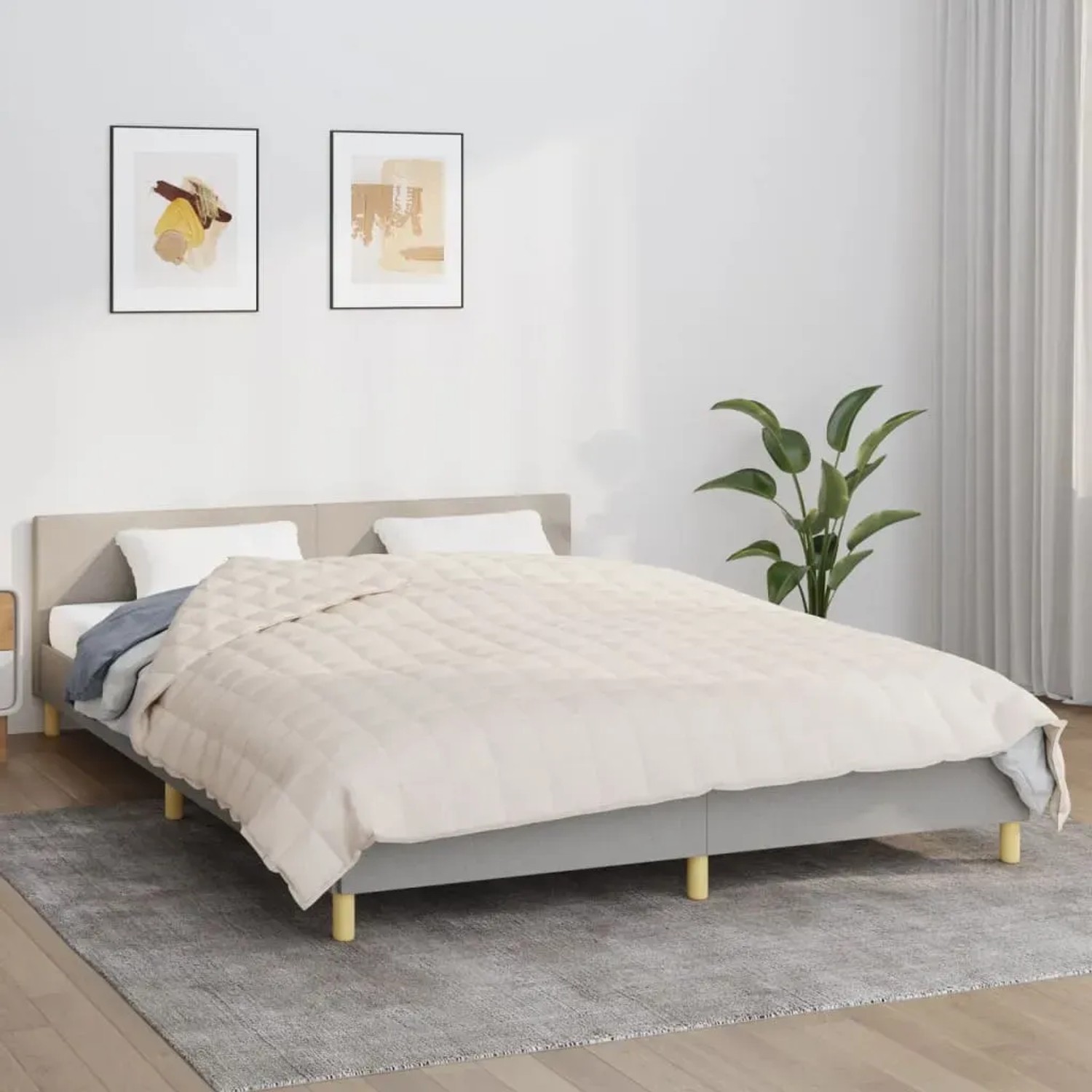 Hellcremefarbene vidaXL Gewichtsdecke (15 kg) auf einem Bett. Ideal für besseren Schlaf.