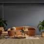 Wohnraum mit Click-Vinylboden Jasmund Eiche in Holzoptik verlegt.