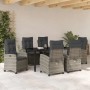 7-teiliges Garten Esszimmer Set aus grauem Poly Rattan mit Kissen.