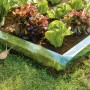 Schneckenzaun aus PET schützt Gemüsebeet vor Schnecken.
