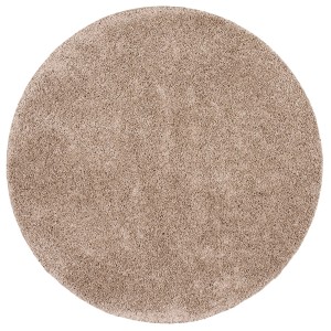 Runder, mauvefarbener Hochflor-Teppich Milano, 100x100 cm. Flauschiger Langflor-Teppich.