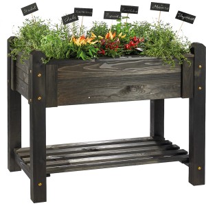 Schwarzes Wilk Hochbeet Premium aus Holz mit Kräutern und Ablage.