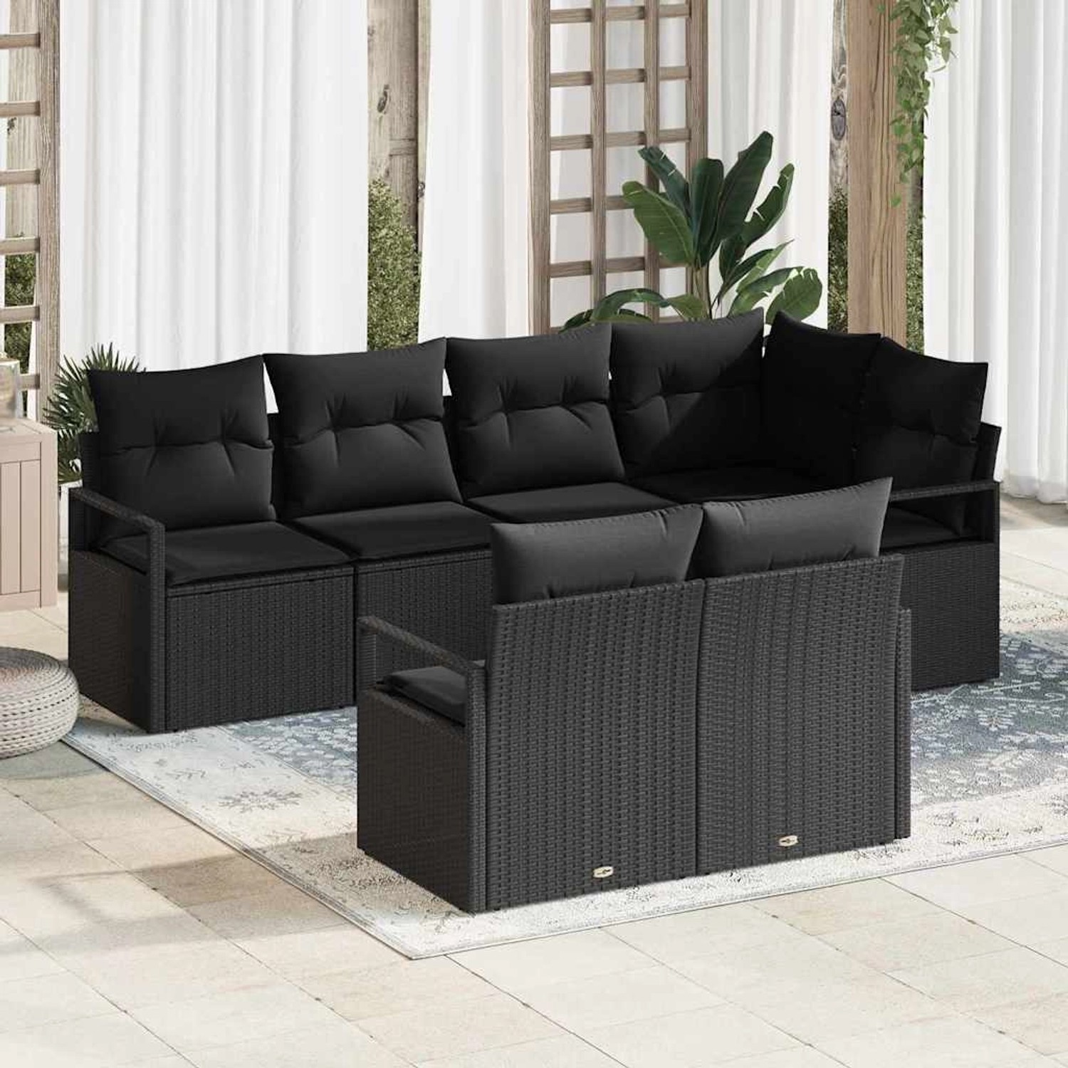 Schwarzes 7-teiliges vidaXL Garten-Sofa-Set aus Poly Rattan für Terrasse und Garten.