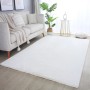 Cremefarbener Ayyildiz Kurzflorteppich Pouffy (160x230 cm) im Wohnzimmer.