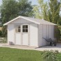 Grosfillex Kunststoff-Gartenhaus Deco H 11 in Graugrün mit Doppeltür und Schubkarre im Garten.
