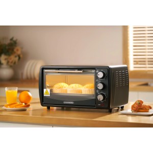Steinborg Minibackofen SB-3005S, 13 Liter, 1200 Watt, schwarz, mit Muffins im Garraum.