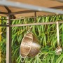 Detailaufnahme: Siena Garden BBQ Pavillon, Taupe, mit Grillutensilien am Dachgestänge.