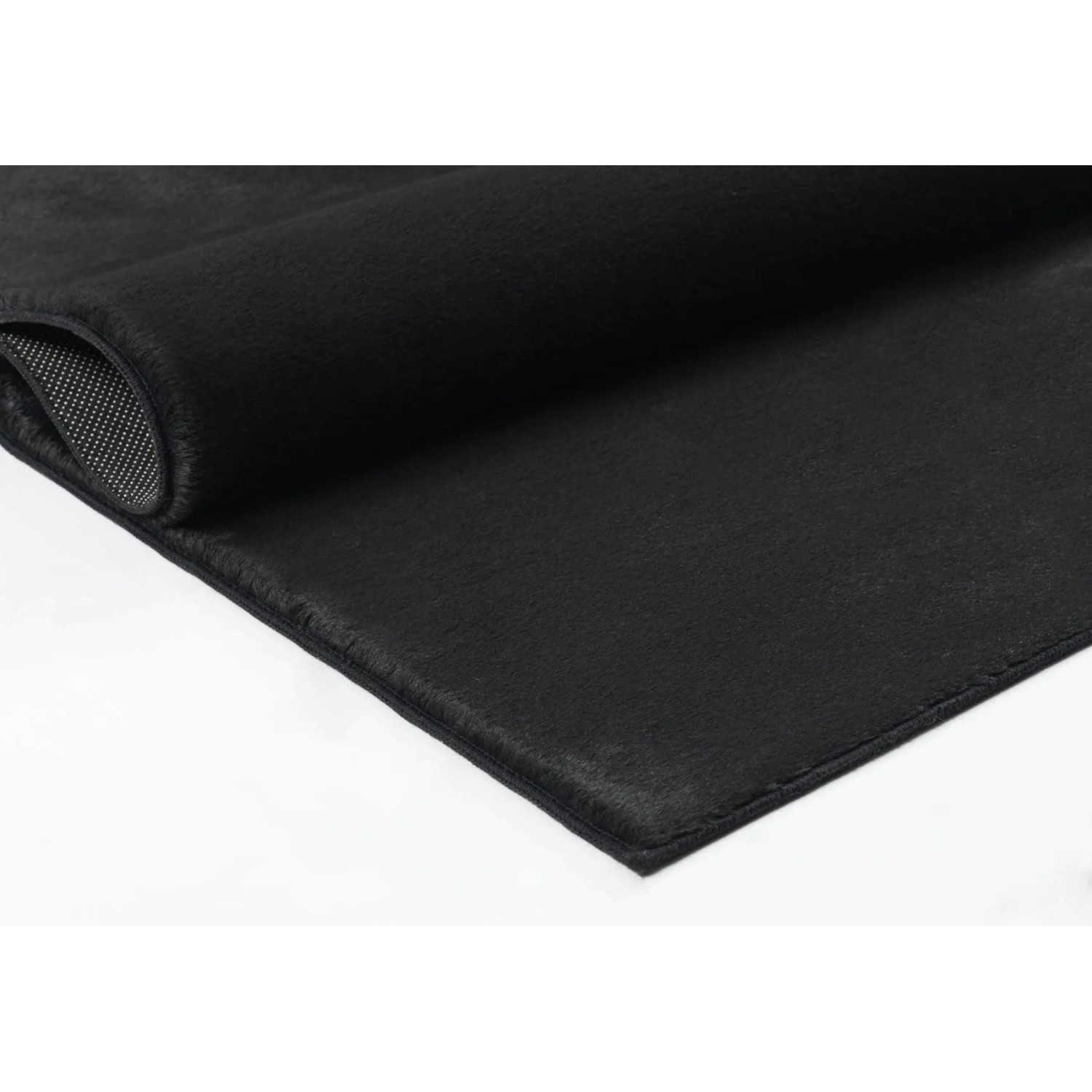 Schwarzer Floornovo Kurzflor Teppich, 340x240 cm, Detailansicht der Teppichstruktur.