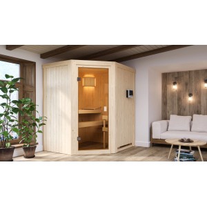 Woodfeeling Sauna Faurin mit bronzierter Glastür und 9 kW Ofen im Wohnraum.