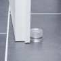 Transparenter Wagner Bodentürstopper Clear (Ø 40 mm) aus Kunststoff auf grauem Fliesenboden.