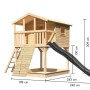 Karibu Stelzenhaus Benjamin aus hellem Fichtenholz mit schwarzer Rutsche und Holzrampe für Kinder im Garten.