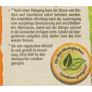 Compo BIO Herbst-Rasendünger: Text zu Anwendung, Sicherheit für Kinder/Haustiere. Rundes Label mit Blättern für ökologischen Landbau.