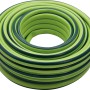 Aufgerollter, grüner Gartenschlauch Cord Standard, 25 m lang, 19 mm Durchmesser.