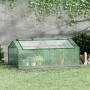 Grünes Furnicato Foliegewächshaus 180x90x70 cm im Garten, mit Pflanzen.