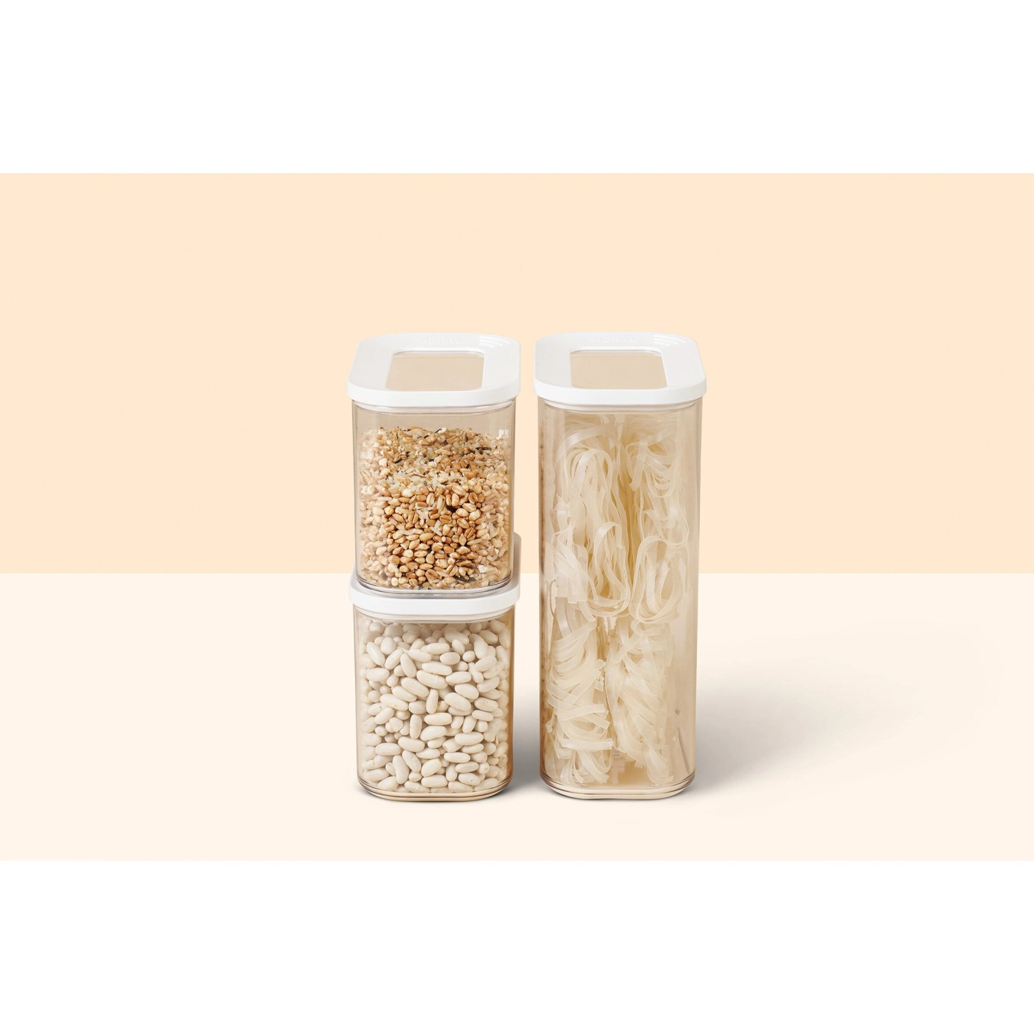 Mepal Modula Vorratsdosen-Set, 3-teilig, weiße Deckel, gefüllt mit Nudeln, Bohnen und Getreide.
