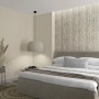Beige Marburg Vliestapete in Travertin-Optik im Schlafzimmer. Dekorative Struktur für moderne Wandgestaltung.