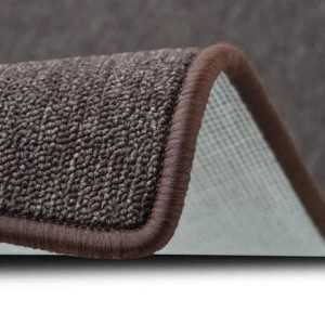 Detailaufnahme: Dunkelbrauner Karat Teppich London mit Schlingenflor und farblich passender Umkettelung.