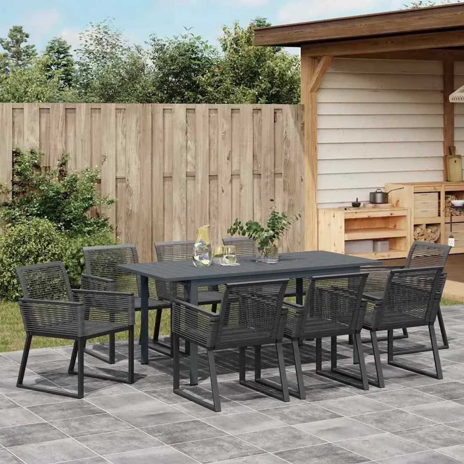 Schwarze vidaXL Garten Essgruppe, 9-teilig, aus Stahl und Poly Rattan. Gartentisch mit 8 Stühlen.