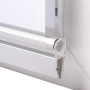 Weißes Doppelrollo mit transparenten und blickdichten Stoffbahnen, Alukassette und Klemmfix-Halterung am Fensterrahmen.