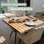 Esstisch: Holz4home Tischplatte aus Eiche mit Baumkante, 140x80 cm, gedeckt mit Speisen.