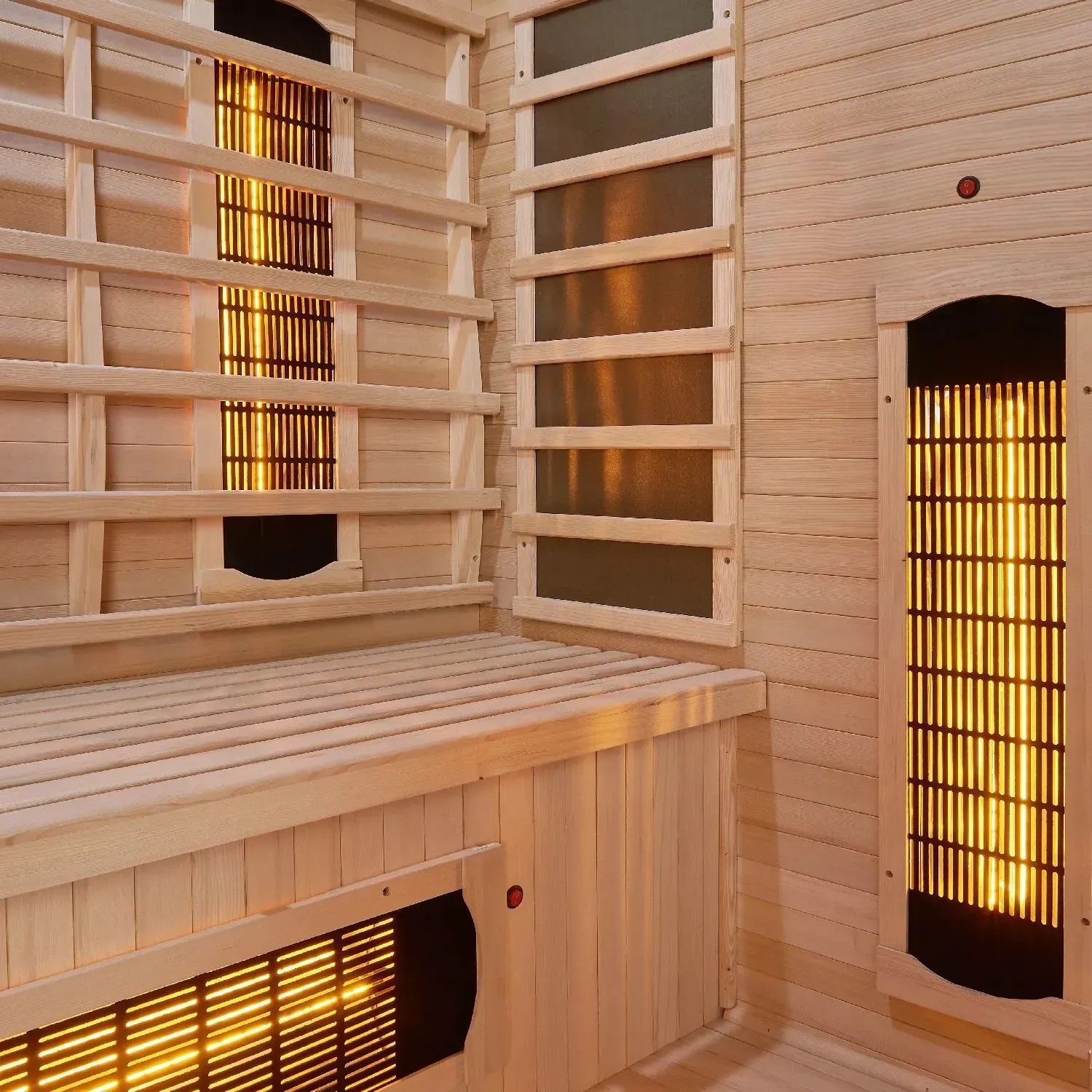 Innenansicht Artsauna Infrarotkabine Kiruna160 aus Hemlockholz mit Sitzbank und Infrarotstrahlern.