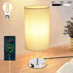 Dimmbare Touch-Tischlampe mit hellem Stoffschirm, Metallfuß, USB-Ladefunktion und E27-Fassung. Lädt Smartphone.