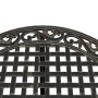 Detailansicht des Bistro-Sets: Bronzefarbener Gartentisch mit filigranem Muster aus Aluminiumguss.