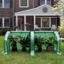 Halbtransparentes, grünes WOLTU Foliengewächshaus mit Pflanzen im Garten.