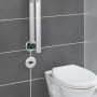 Wenko klappbarer Badstützgriff Secura Premium aus Aluminium neben einem WC an grauer Wand.