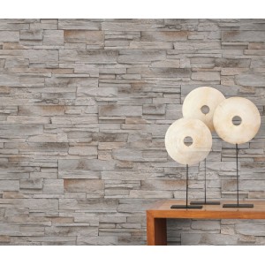 Beige Vliestapete „Stones Klein“ von Erismann mit Steinmuster für ein natürliches Wohnambiente.