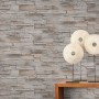 Beige Vliestapete „Stones Klein“ von Erismann mit Steinmuster für ein natürliches Wohnambiente.