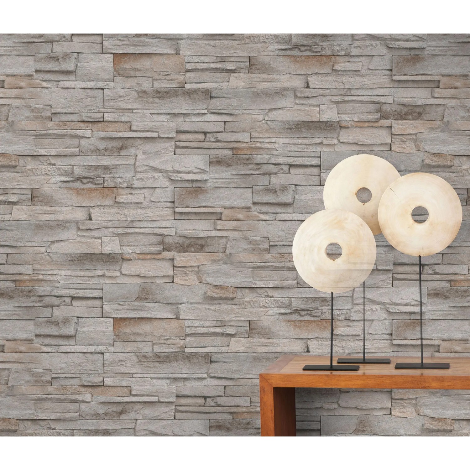 Beige Vliestapete „Stones Klein“ von Erismann mit Steinmuster für ein natürliches Wohnambiente.