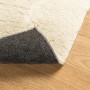 Cremefarbener, waschbarer Kurzflor-Teppich (80x200 cm) mit rutschfester Unterseite.