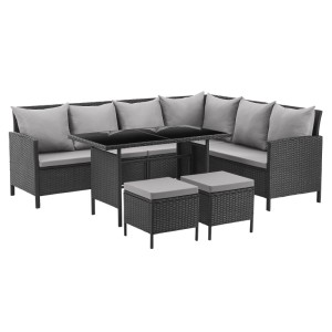 Schwarze Svita Madison Rattan Lounge Ecksofa Gartenmöbel-Set mit Tisch und Hockern.