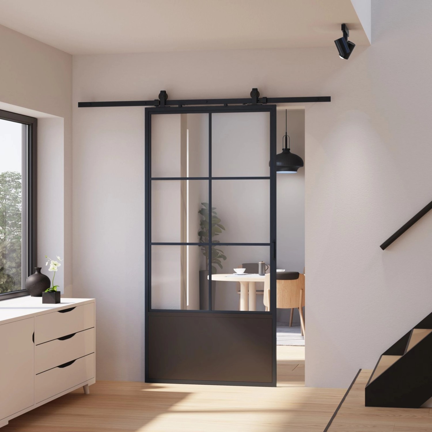 Schwarze inova Loft Glasschiebetür mit 6 Feldern und Kickplatte im modernen Wohnraum.