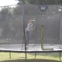 Grünes EXIT Silhouette Trampolin D305cm mit Sicherheitsnetz und Fußschutzsystem.