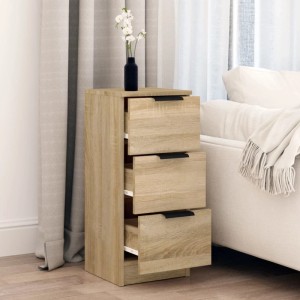 Schlankes Sideboard Sonoma-Eiche mit 3 Schubladen und schwarzen Griffen, neben Sofa und Vorhang.