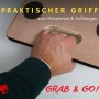Detailaufnahme Transportroller mit Griffmulde und Hand. Werkstattwagen Zubehör für einfachen Transport.