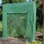 Grünes Gewächshaus (1,17 m²) mit Pflanzen im Garten.