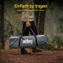 Person trägt graue SoBuy Tragetasche mit Feldbett und Zelt durch Wald. Praktisch für Camping & Outdoor Reisen.