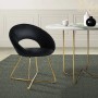 Schwarzer ML-Design Esszimmerstuhl aus Samt mit runder Rückenlehne und goldenem Gestell.