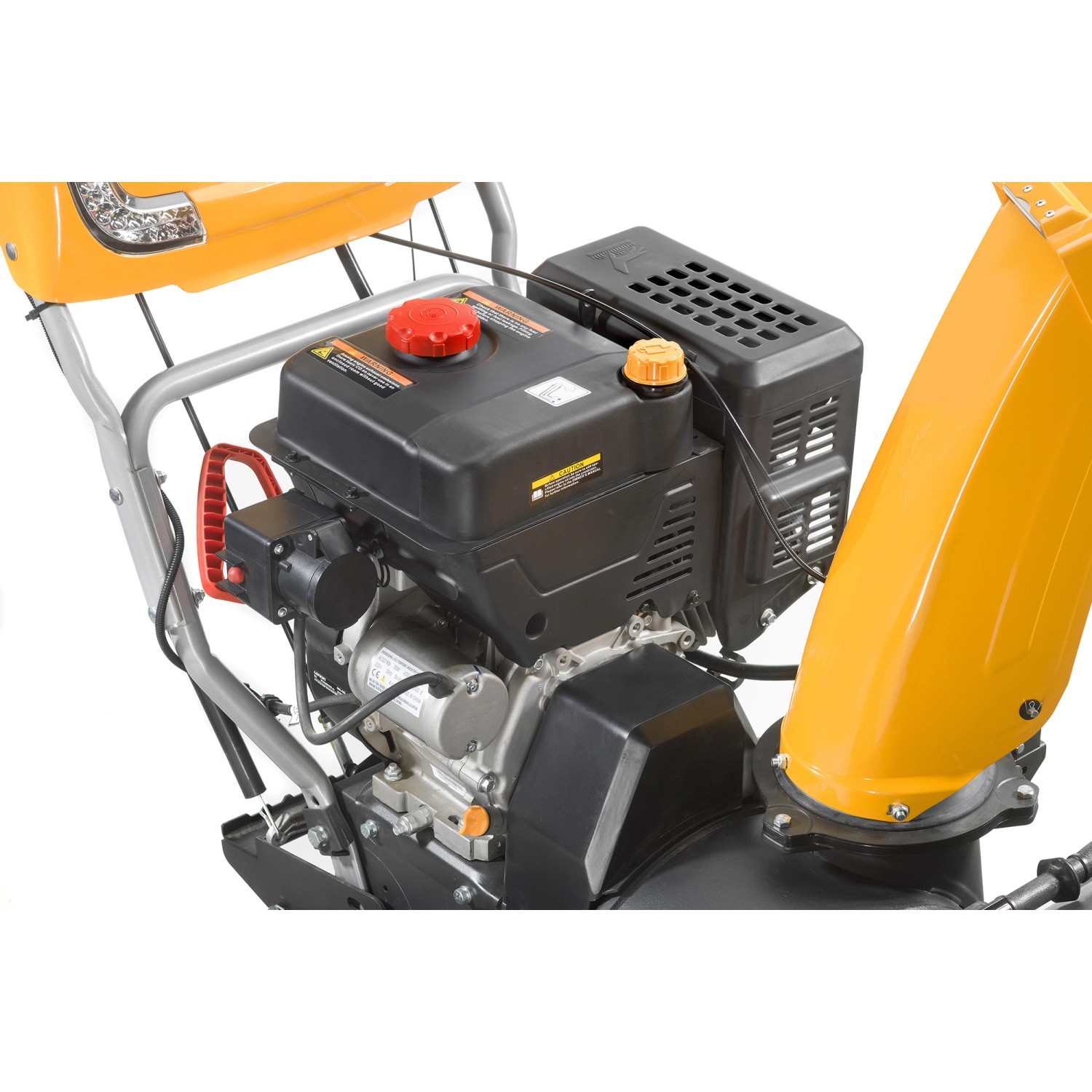 Detailaufnahme: Stiga ST 6272 P TRAC Benzin-Schneefräse mit Raupenantrieb und gelbem Auswurfkanal.