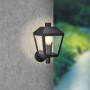 Schwarze Außenwandleuchte Vigevano aus Aluminium-Druckguss mit E27 Fassung an grauer Wand.