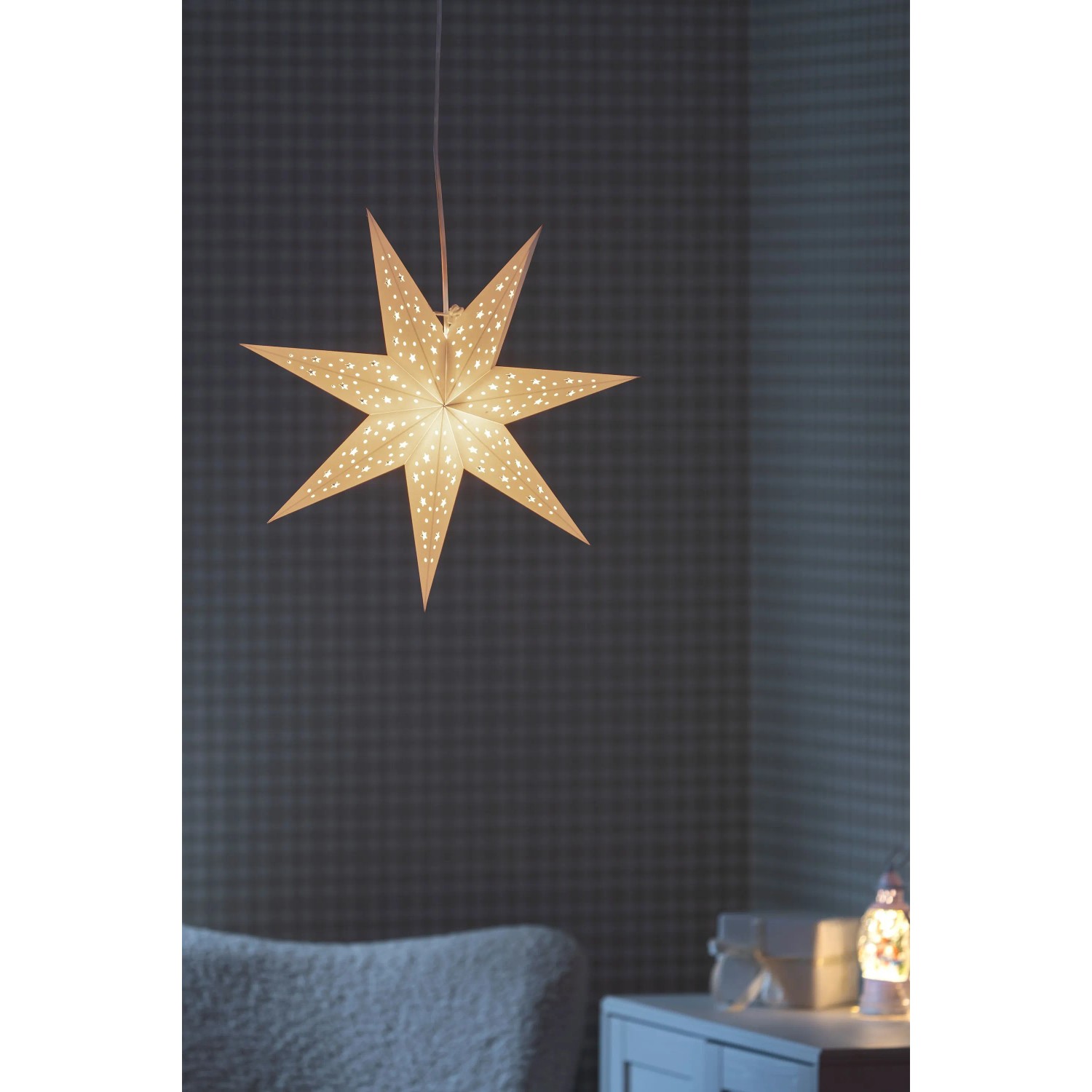 Leuchtender weißer Papierstern mit 7 Zacken, Ø 45 cm, als Weihnachtsdekoration für den Innenbereich.