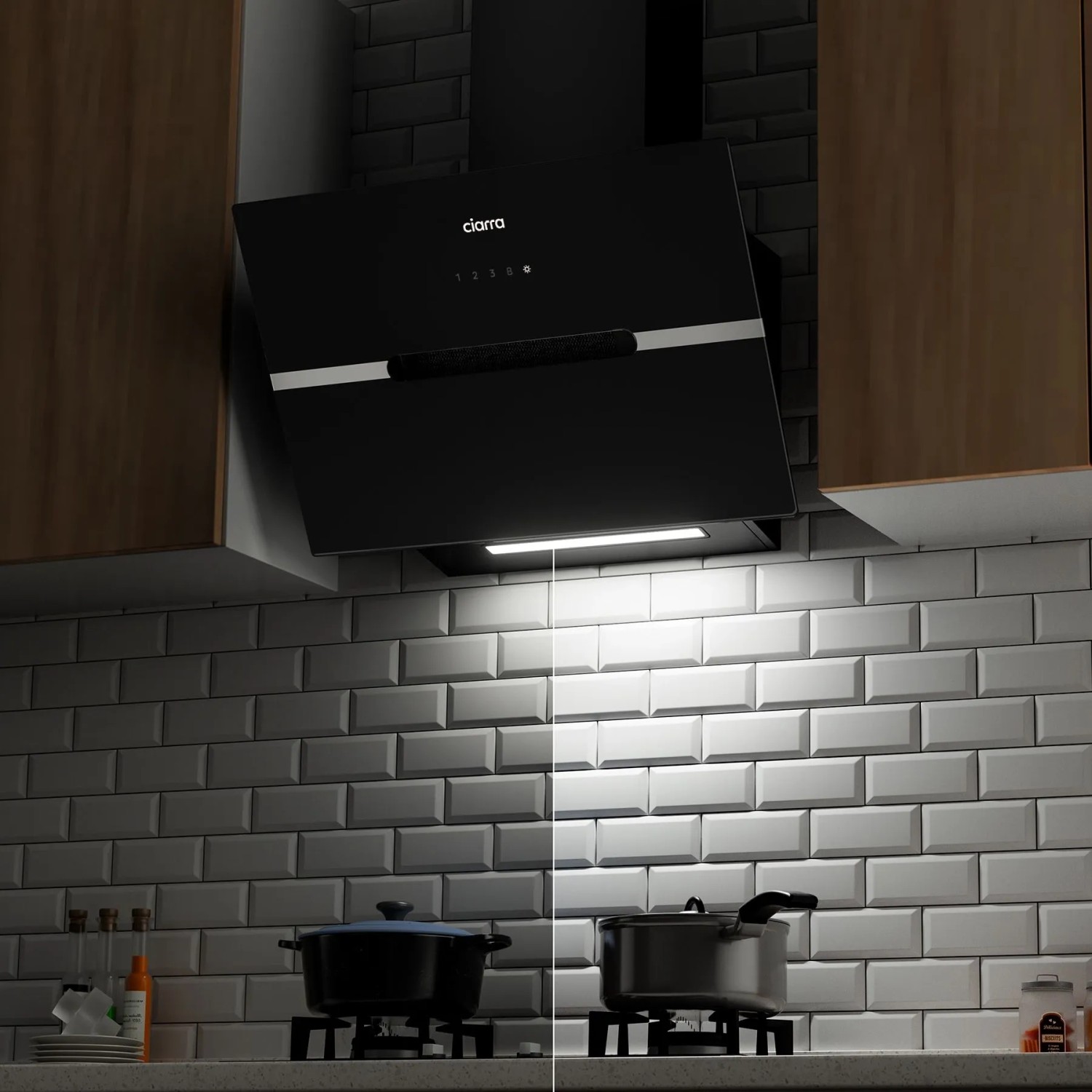 Schwarze CIARRA Kopffreihaube 60 cm in Küche. LED-Beleuchtung leuchtet Kochfeld aus. Mit Touch Control.
