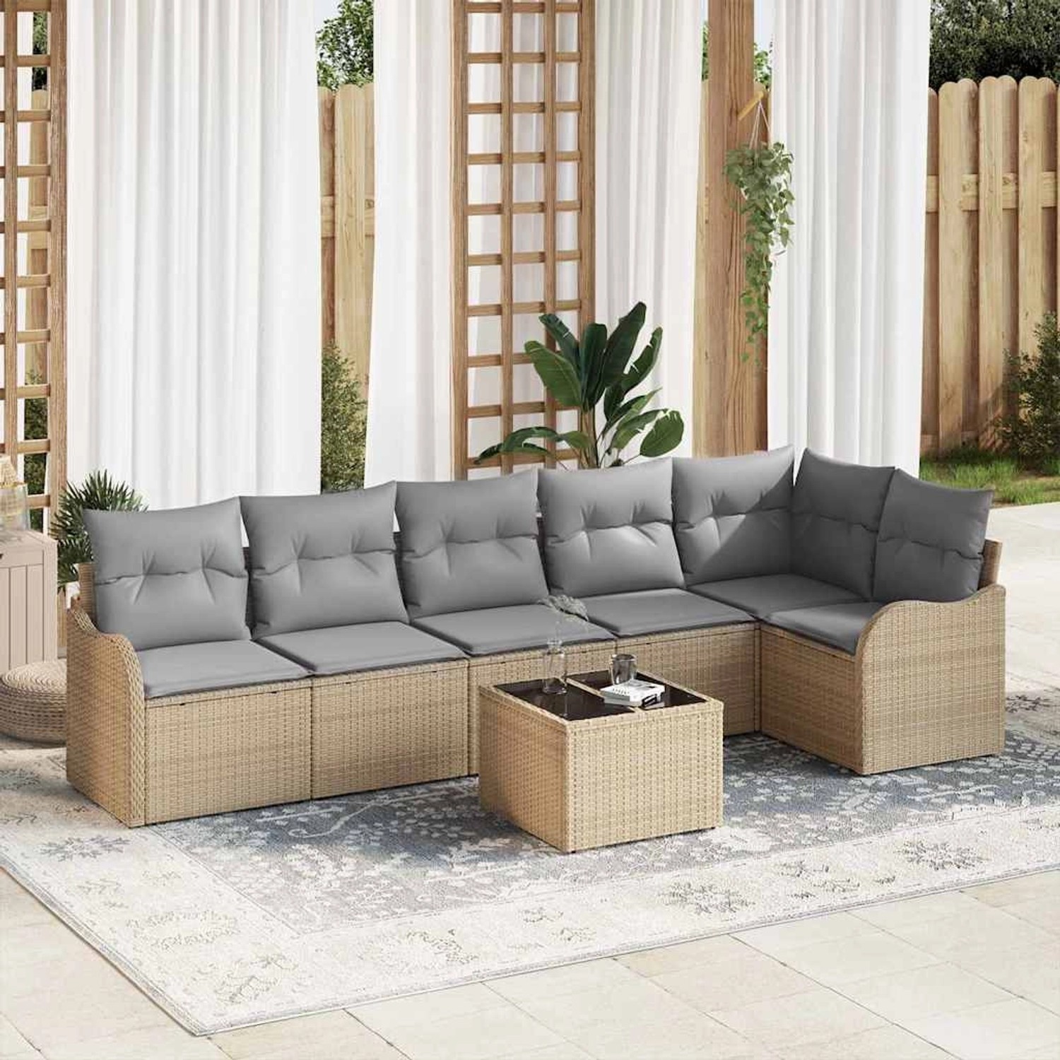 Beiges 7-teiliges vidaXL Garten-Sofa-Set aus Polyrattan mit Kissen und Tisch.