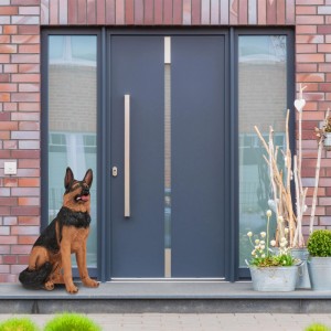 Detailreiche Schäferhund-Figur (85cm) aus Polyresin in Schwarz und Braun für den Garten.