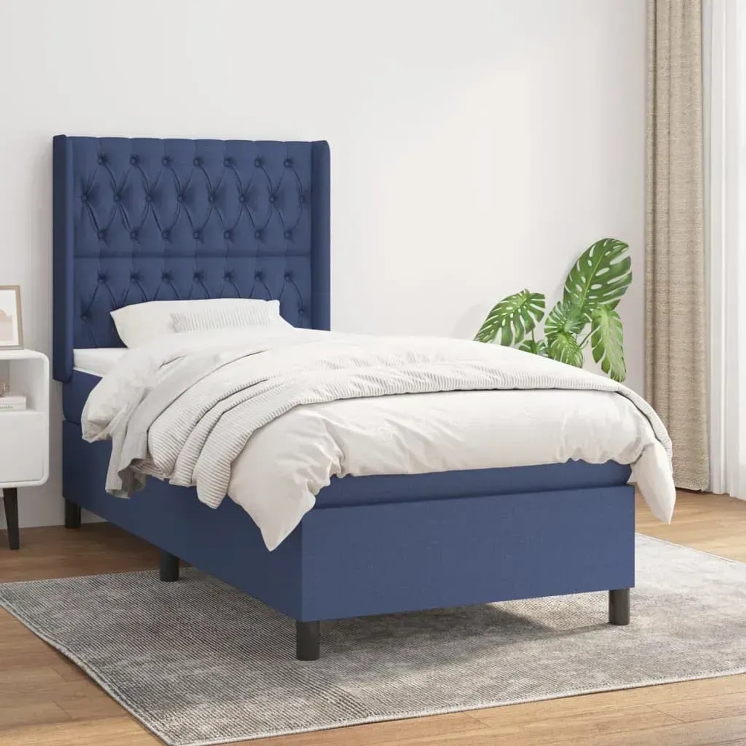 Blaues vidaXL Boxspringbett (90x200 cm) mit Matratze und Stoffbezug.