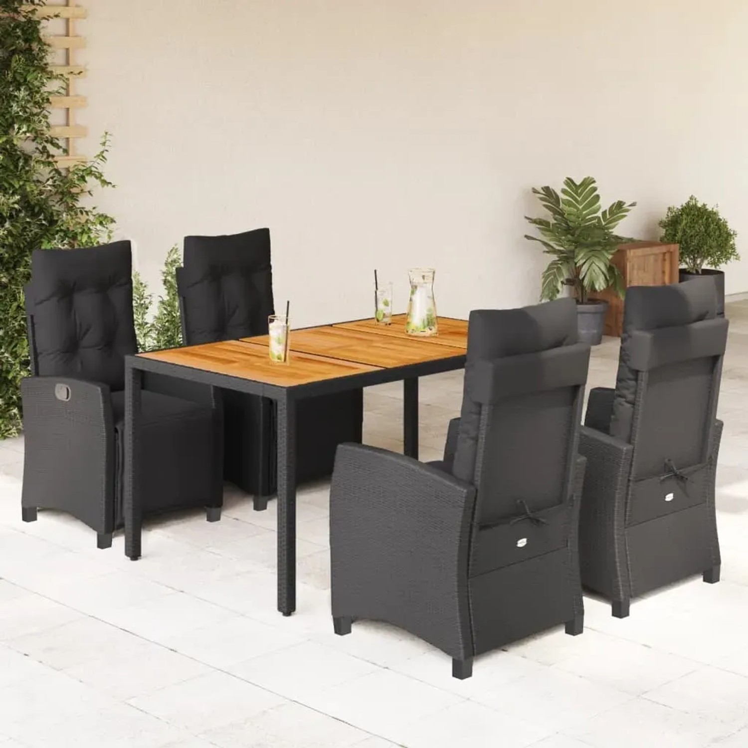 Schwarze 5-tlg. Garten-Essgruppe aus Polyrattan mit Tisch und Sesseln mit Kissen für Terrasse oder Garten.